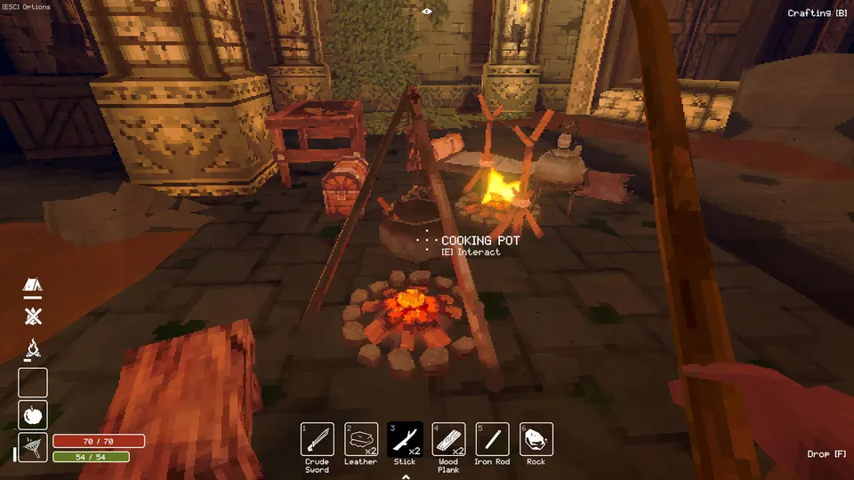 A cooking pot hangs over a campfire in Deep Dish Dungeon.